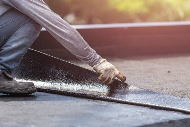 Professional Basement Waterproofing technician working in Paramus, NJ